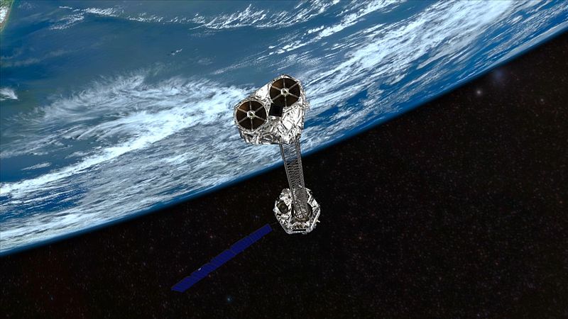 Artist's concept of NuSTAR on orbit. NuSTAR has a 10-m (30') mast that deploys after launch to separate the optics modules (right) from the detectors in the focal plane (left). The spacecraft, which controls NuSTAR's pointings, and the solar panels...