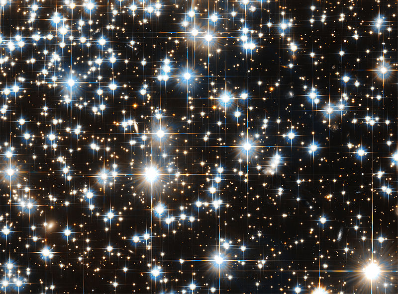 Hubble Telescope image of distant stars showing diffraction artefacts.