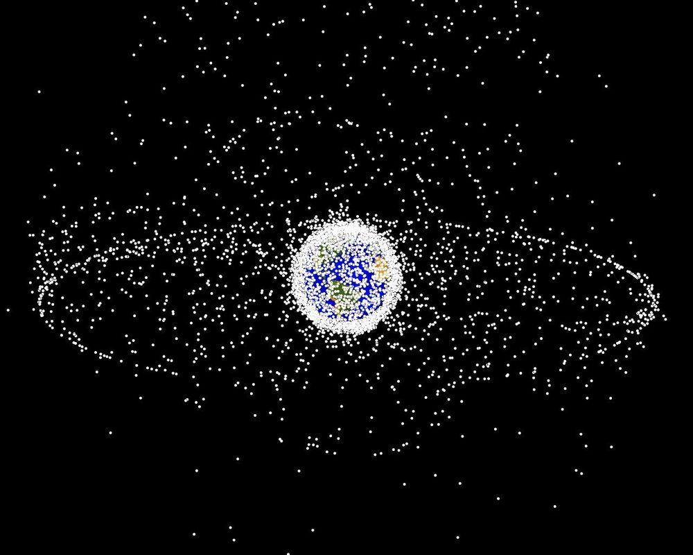 Image representing the amount of space junk around the earth: dots are not to scale.