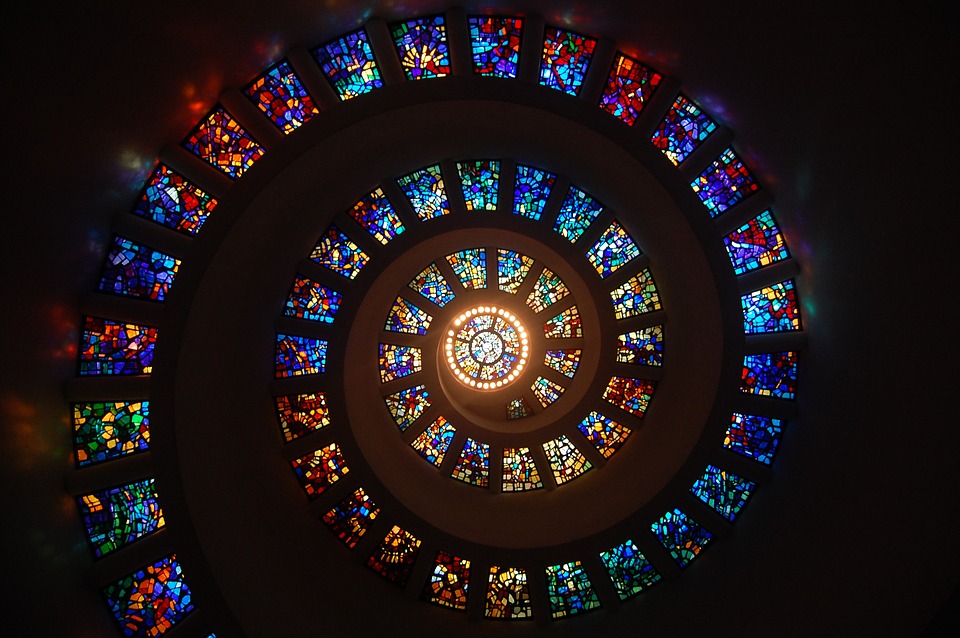 A spiral made of different stained glass windows