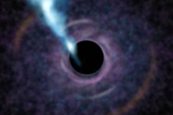 艺术家的概念是未来的望远镜在观察M87星系中心的黑洞时可能会看到什么。块状气体在吸积盘中围绕黑洞旋转，为中心的巨兽提供食物。中心的黑色区域是黑洞……