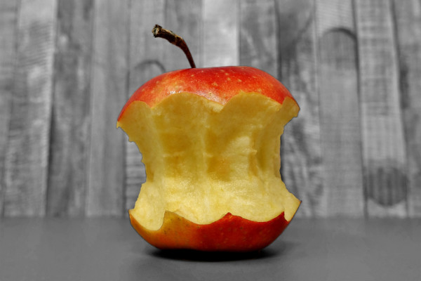 An apple, part-eaten