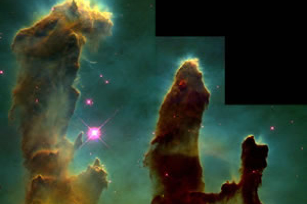 图2:鹰状星云。1995年4月1日，哈勃望远镜拍摄了这张著名的鹰状星云柱状结构的照片。这些柱子实际上是星际氢气和尘埃的柱子，它们导致了恒星的形成。