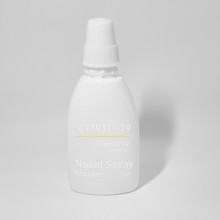A COVID-19 nasal vaccine bottle.