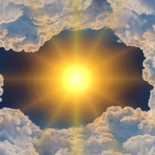 阳光透过云层中的一个有风格的洞照进来。