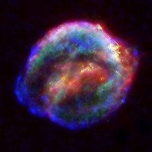 开普勒超新星的残骸——这张图片是由美国宇航局的斯皮策太空望远镜、哈勃太空望远镜和钱德拉x射线天文台拍摄的图像合成的。